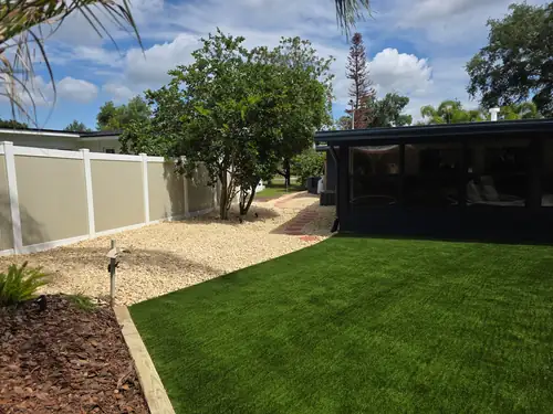 Left side of the Sanford backyard turf and planting beds