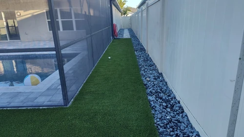 Left side of the Winter Park yard with new turf and clean edging